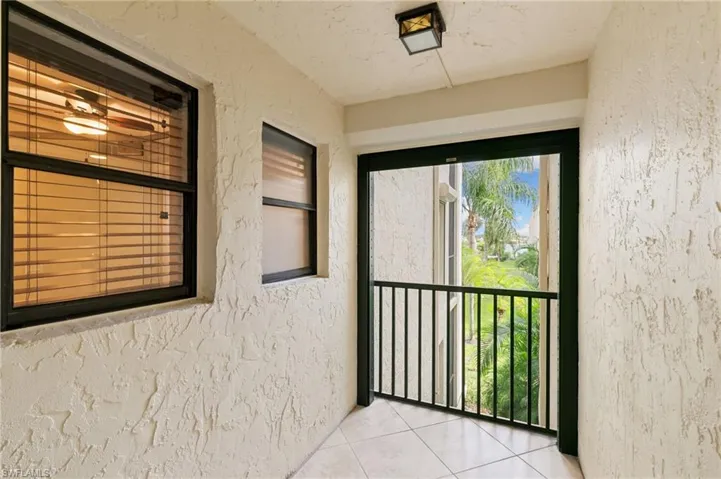 Guest bedroom has it's own lanai with electric shutter