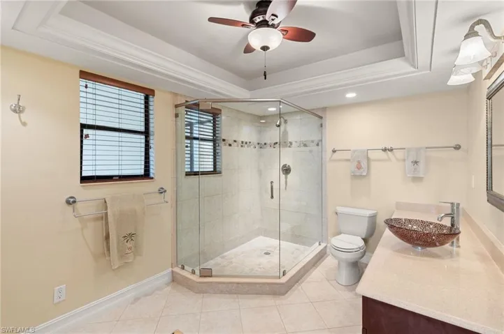 Large primary bathroom with updated shower