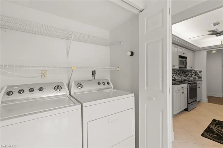 Laundry in the unit near kitchen