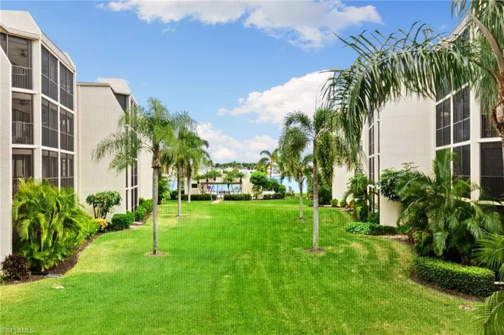 Views of the water and lush lawn, second floor unit