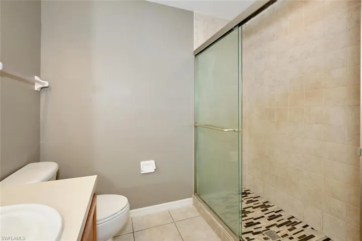 Primary bath with tiled shower