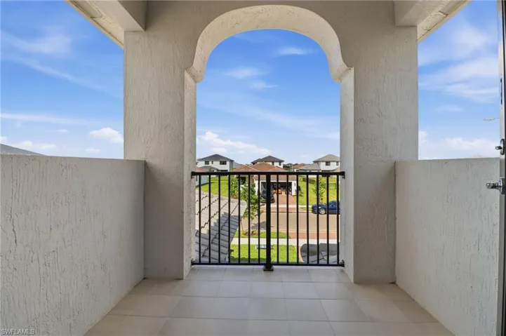 Balcony featuring a residential view