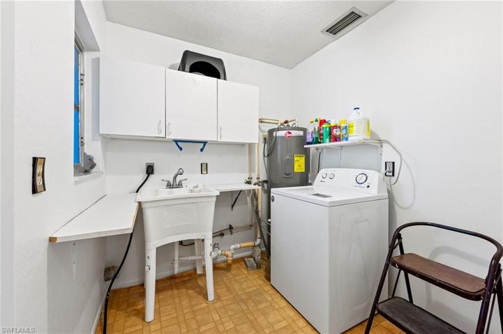 Laundry Room just in from the Garage.