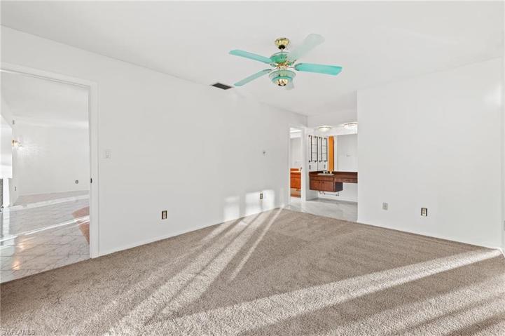 Entrance from Living/Family room on left. Makeup area & master Bath area in center.