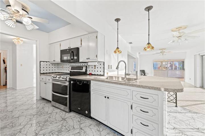 Bright kitchen open to eat-in area and Family Room