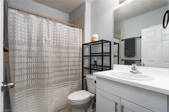 Bathroom with vanity and a tub/shower combo