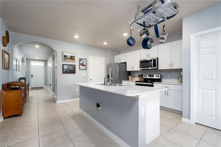 Flows seamlessly to Living and Dining Rooms