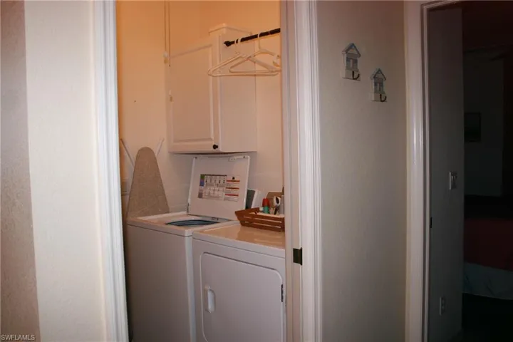 Laundry room featuring separate washer and dryer