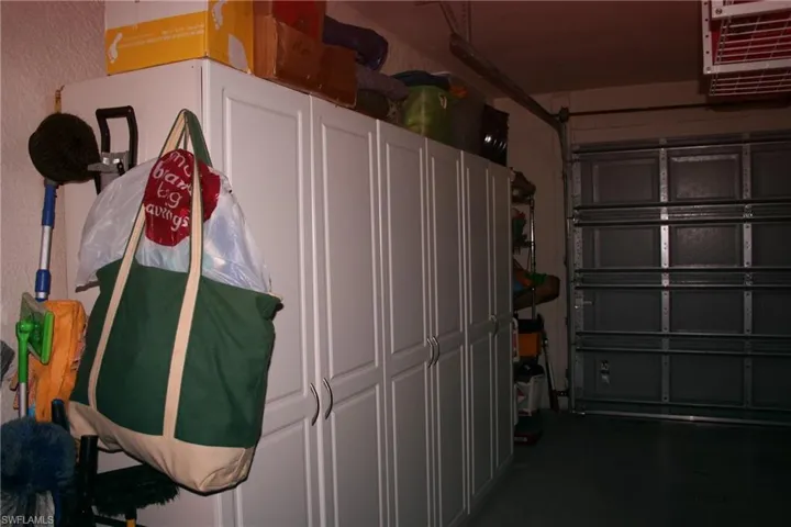 Garage featuring a heating unit