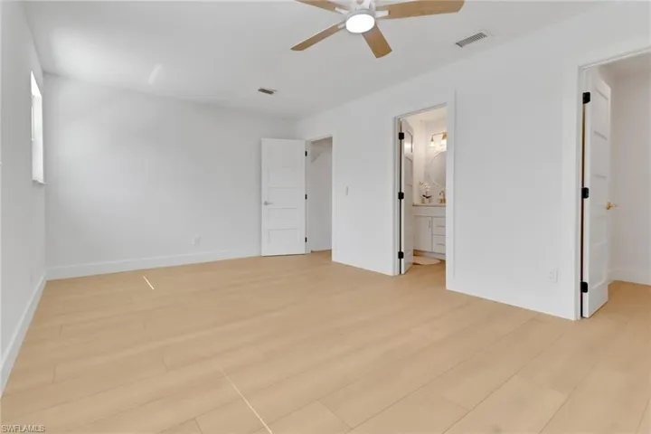 Oversized guest bedroom with walk in closet