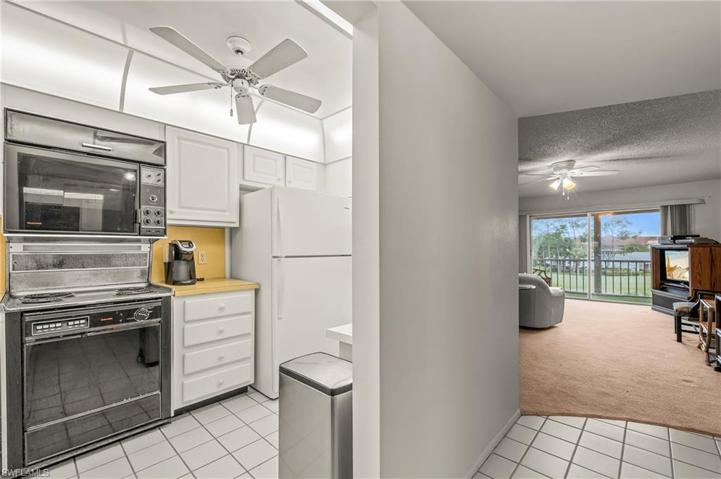 Walk in the front door and the kitchen is to your left, with the great room and golf course views in the rear.