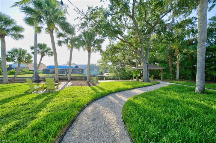 Relax on your dock under your shaded Gazebo or around your firepit while you enjoy the sounds of birds, watch the squirrels playing & catch the occasional manatee or dolphin right from your back yard as you hear the fish jumping.