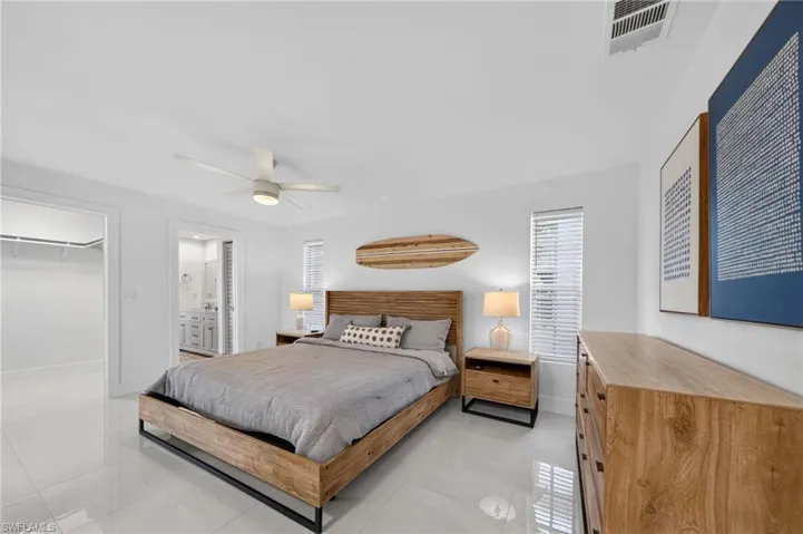 Primary Bedroom offers two large walk-in closets