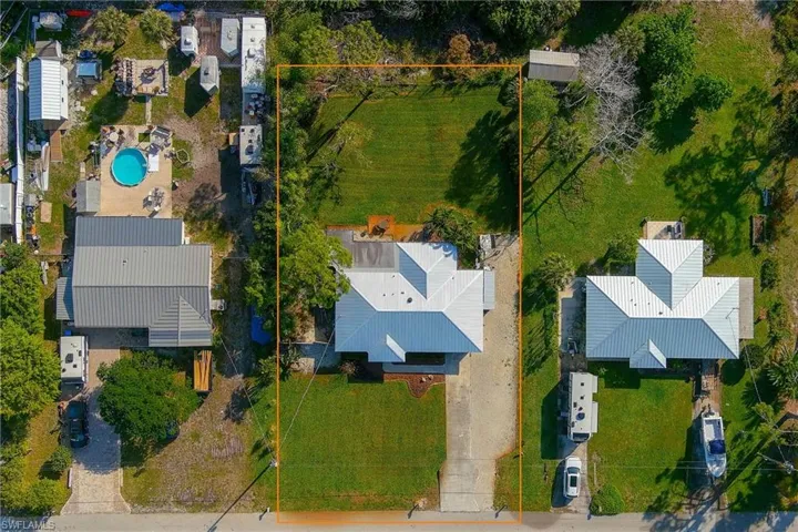 One can see that both the front and back yards are quite spacious, as well as an extra large driveway.