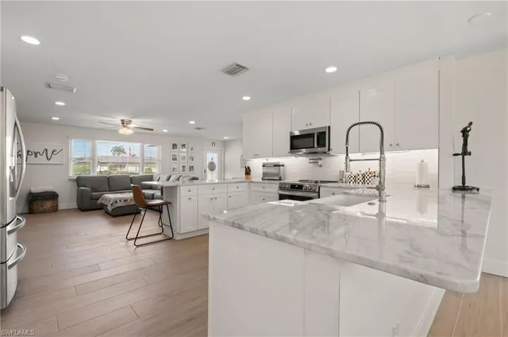 A view of the kitchen next to the living room.