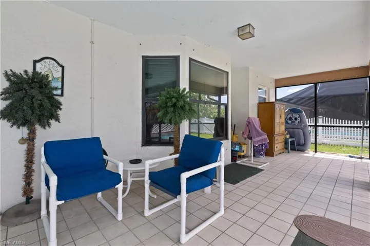 View of patio with glass enclosure