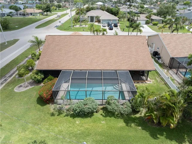 Aerial view of residential area with a pool