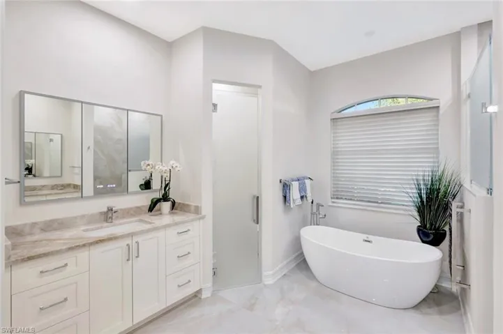 Second vanity and Private water closet w/ frosted glass door
