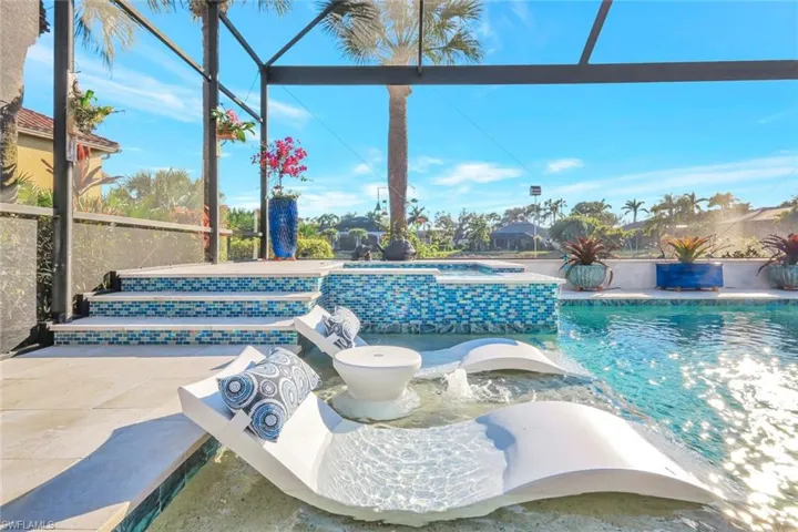 Modern sun-shelf with a raised spa, to elevate your view as your relax and unwind