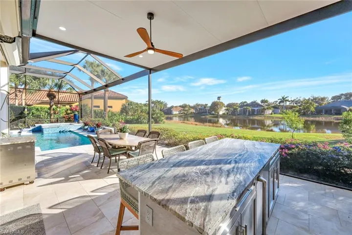 Extended cover lanai space with spacious bar and an unbelievably view for the family grill master