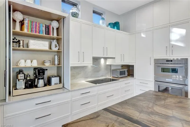 Thoughtfully designed slide-out coffee bar and appliance garage