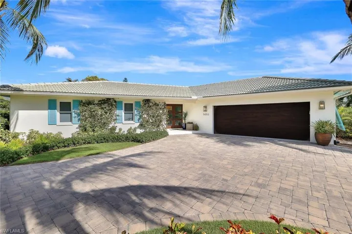 Ranch-style house with a garage
