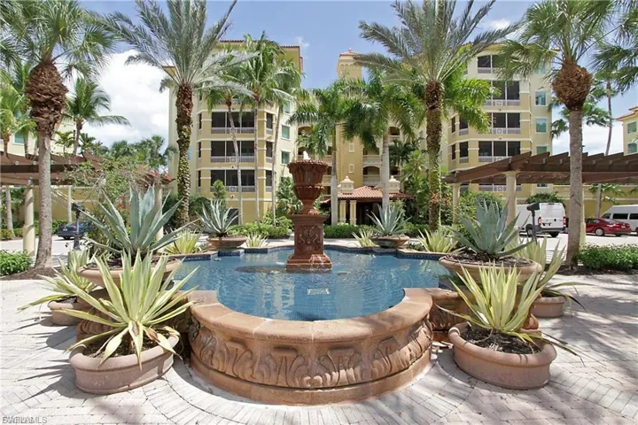 Surrounding community featuring a pergola and a patio