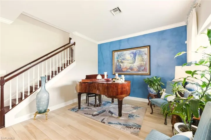 Living room by the entrance, piano room