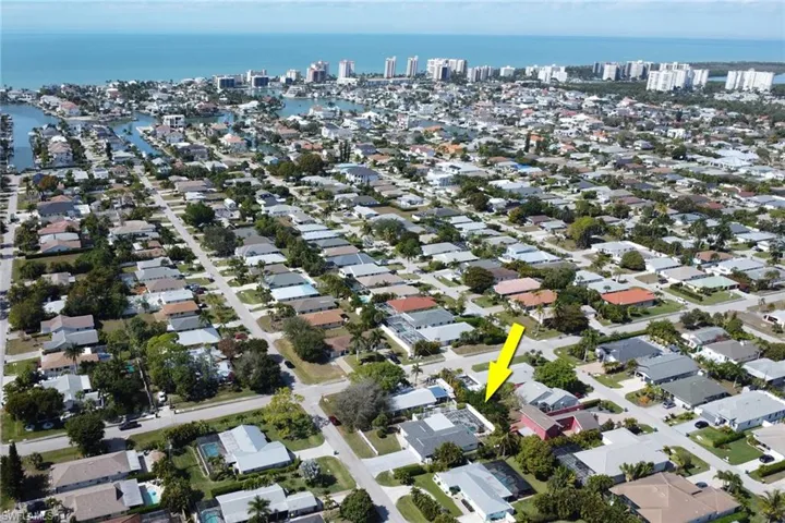 Aerial view of property and surrounding area; non-flood zone