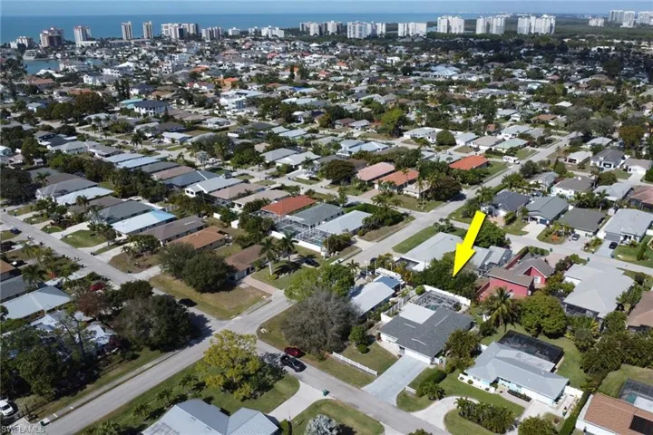 Aerial overview of property's location showing proximity to water; non-flood zone