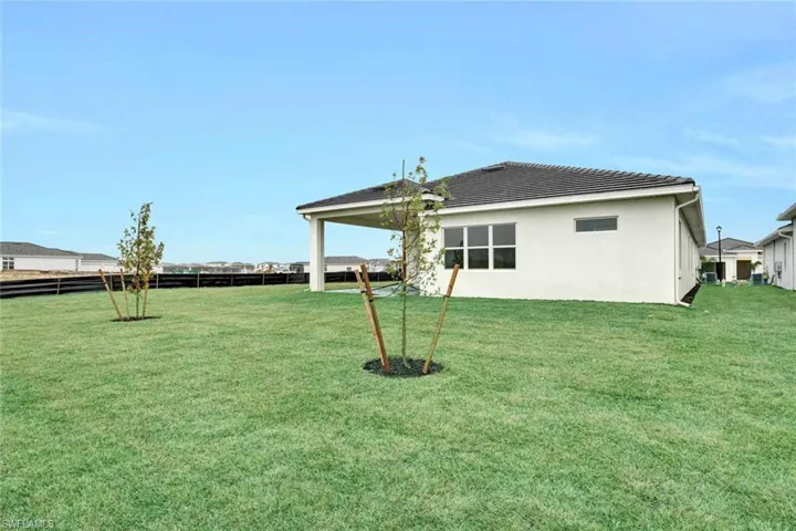 Spacious, covered lanai in backyard