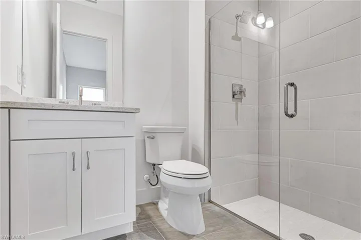 Guest bathroom with comfort height toilet, Kohler tub and plumbingGuest bathroom with comfort height toilet, Kohler tub and plumbing