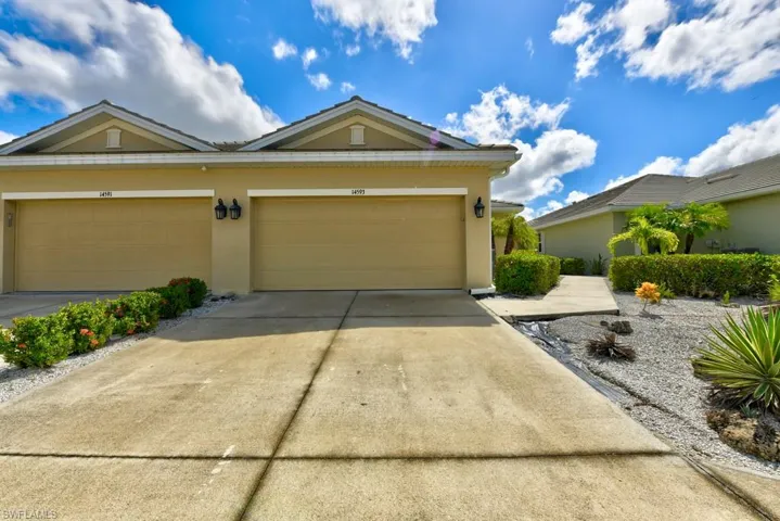View of front of property with a garage