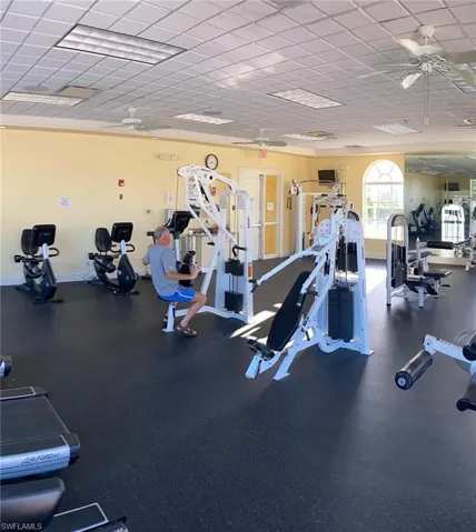 Exercise room featuring ceiling fan
