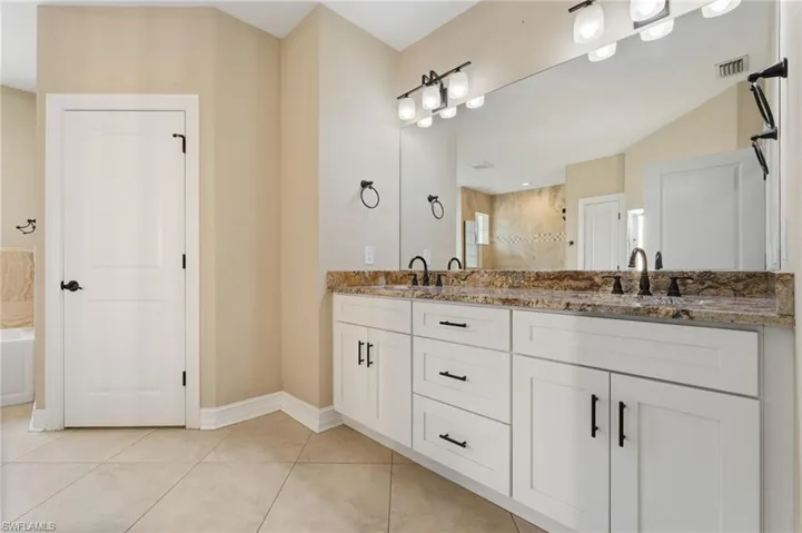 Master bath features dual sinks