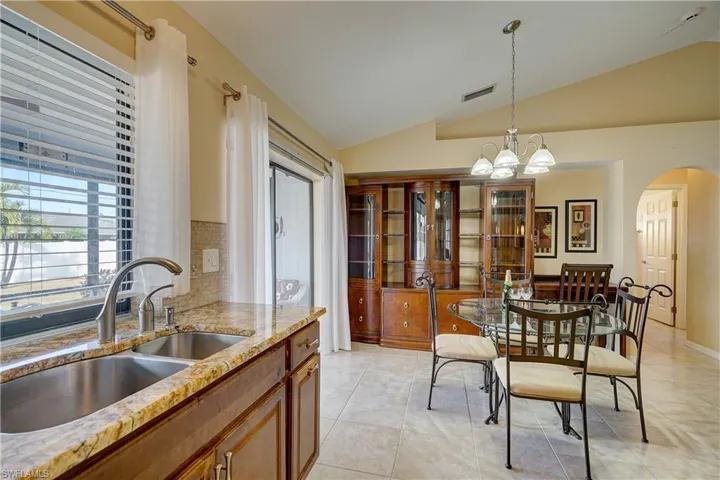 A large capacity double sink with a view of the yard