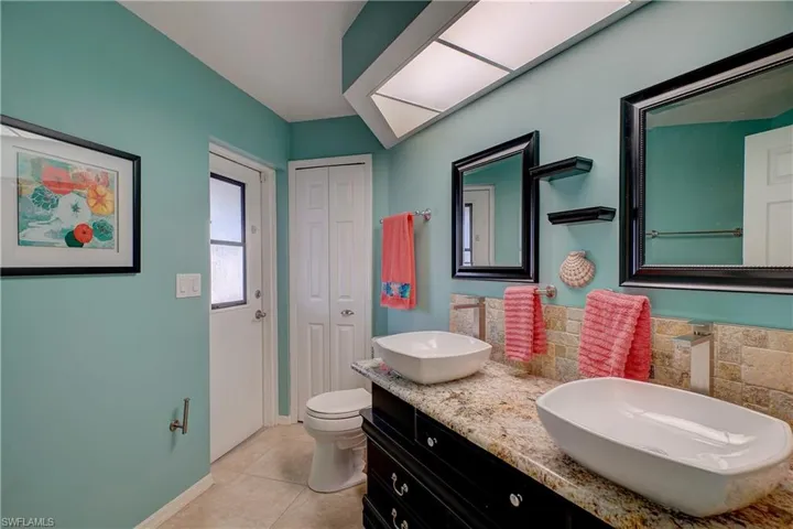 Ultra sleek & modern double vanity with more gorgeous granite countertops