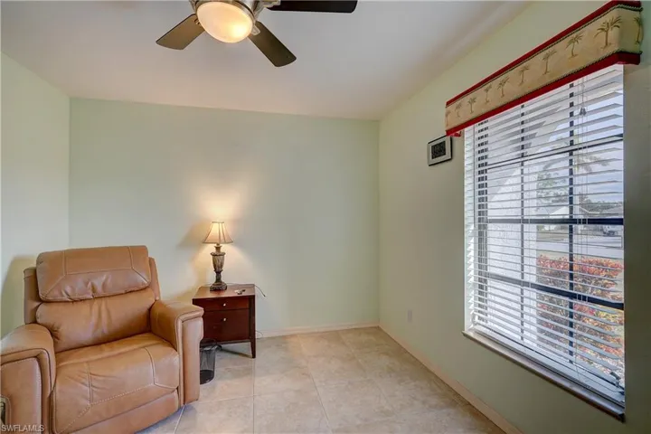 Notice there is no carpet in this home. Easy to clean tile throughout the home, also makes it nice & cool