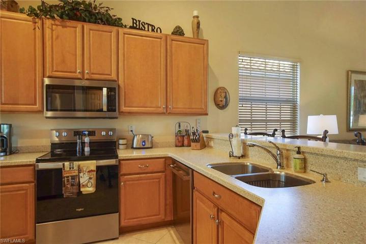 42" Maple Cabinets & Corian Countertops