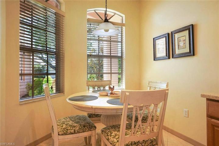 Breakfast Nook with rays of natural light overlooks front yard