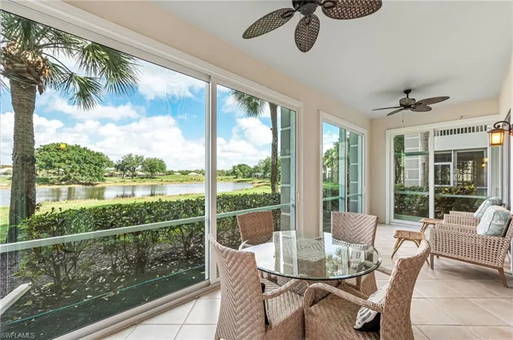 Sunroom / solarium with a water view, impact windows and doors make this part of the interior space.