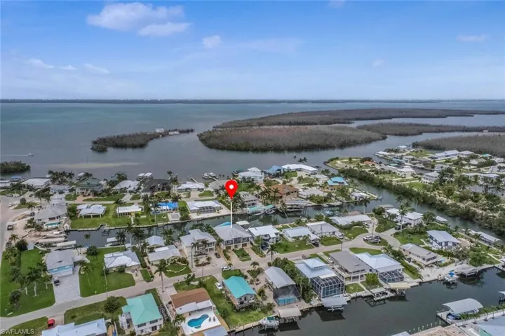 Birds eye view of property with a water view - Pine Island Sound