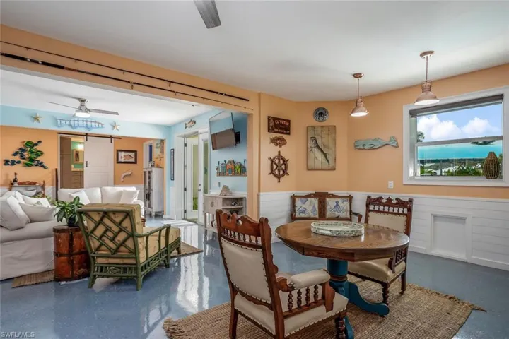 ground floor bonus room with ceiling fan