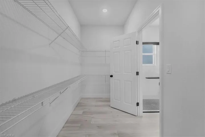Primary Suite Walk in Closet