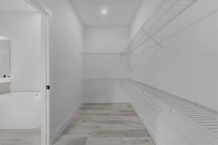 Primary Suite Walk in Closet