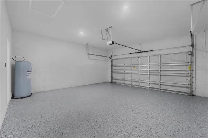 Two car garage offers epoxy flooring