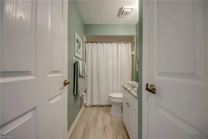 Guest Bath with Linen Closet.