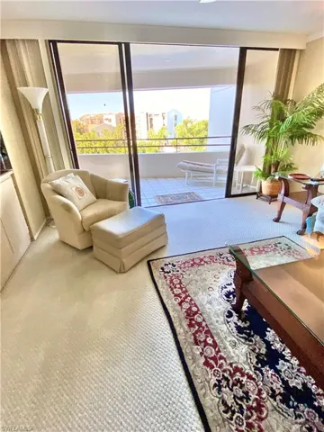 Directly off the living room with storage closet on balcony as well.