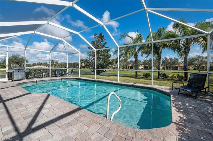 28196 Jewel Fish Ln Bonita Springs FL 34135 - Pool with wrap around lake view