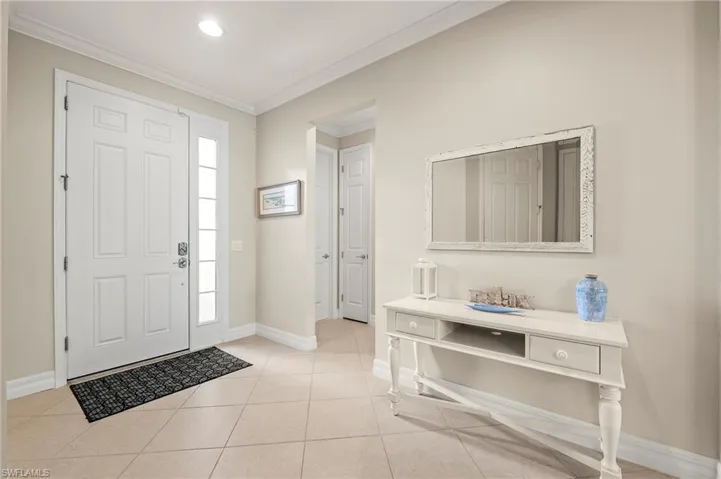 28196 Jewel Fish Ln Bonita Springs FL 34135 - Foyer with crown moulding